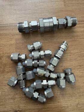 Ss-4-1 Swagelok Various Pieces Mostly 1/4 Inch Nuts And Nupro 1psi Check Valve