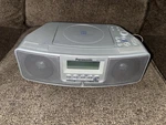 Panasonic Player Radio Alarm Clock Combination Model RC-CD500 Silver (tested). Fixed Price $39.99.