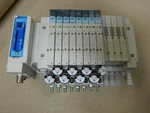 Smc 204-1683-0 12-SLOT Pneumatic Manifold SY3300T-5NZ1 Solenoid EX260-SIL1 I/o. Fixed Price $225.00.