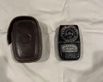 General Electric Exposure Light Meter With Leather Case Bonus Hand Warmer. Fixed Price $9.99.